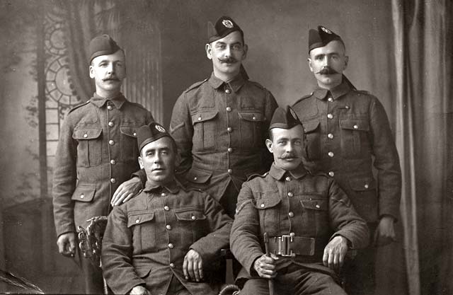 Photograph of two brothers from Leith with whippets - taken by an unidentified photographer